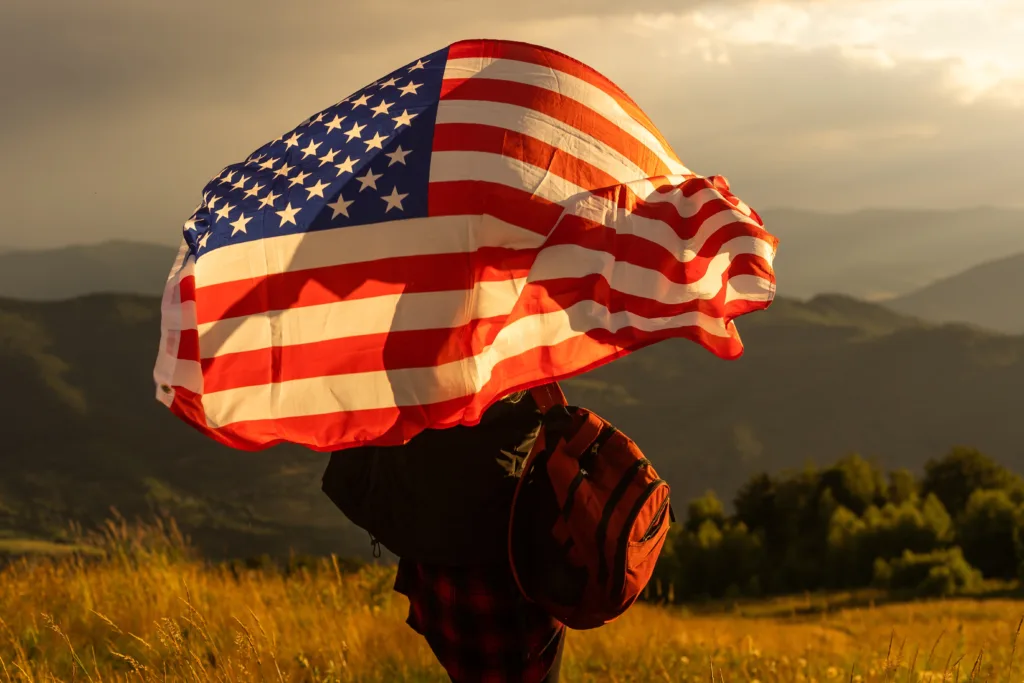 Immigrant American Flag Waving